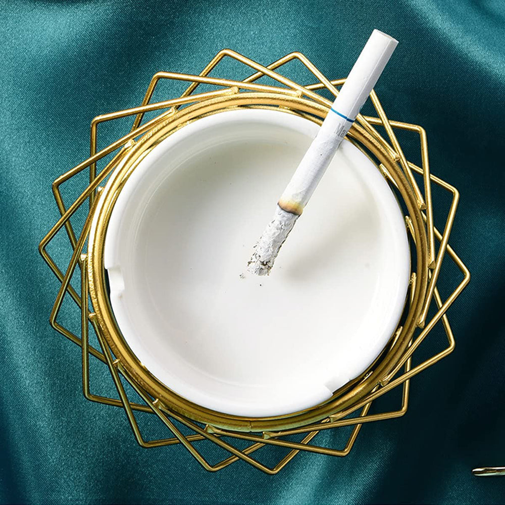 Ceramic ashtray with unique metal golden stand
